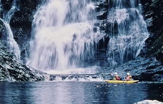 Kayaking at Morpho Falls in the Upper Sibun River