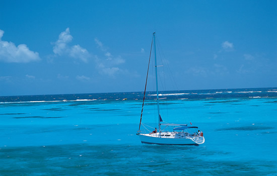 Sailing through blue waters of Union Island