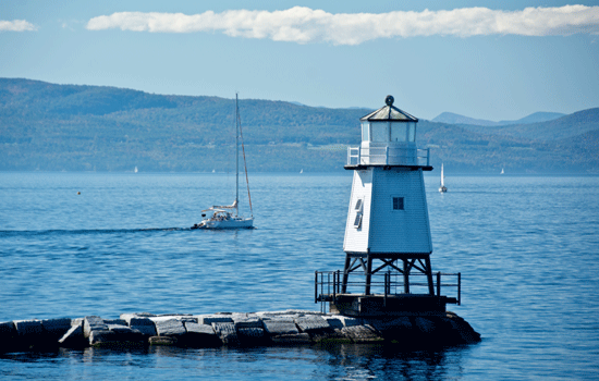 Boats behind Burlington light house