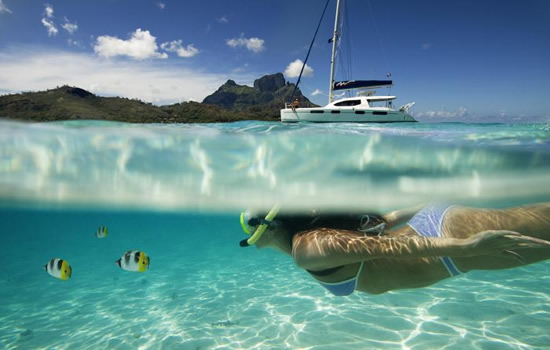 Swim on the cristal clear waters of Tahiti