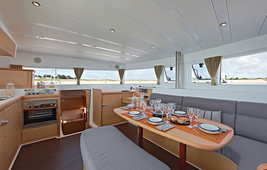 Spacious and elegant salon and galley of the Lagoon 42 Luxe