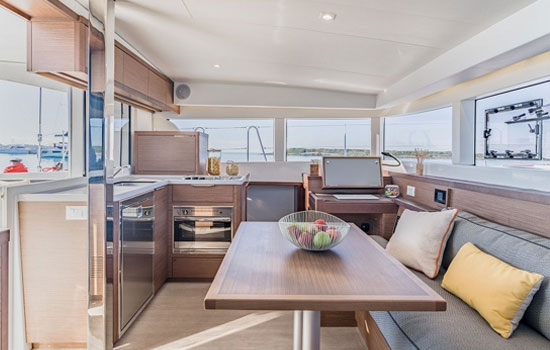 Spacious and elegant salon and galley of the Lagoon 400