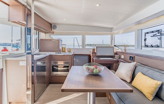 Spacious and elegant salon and galley of the Lagoon 400 S2