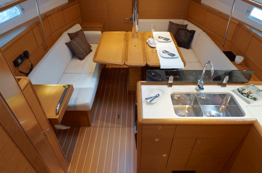 Spacious salon and galley of the Sun Odyssey 379